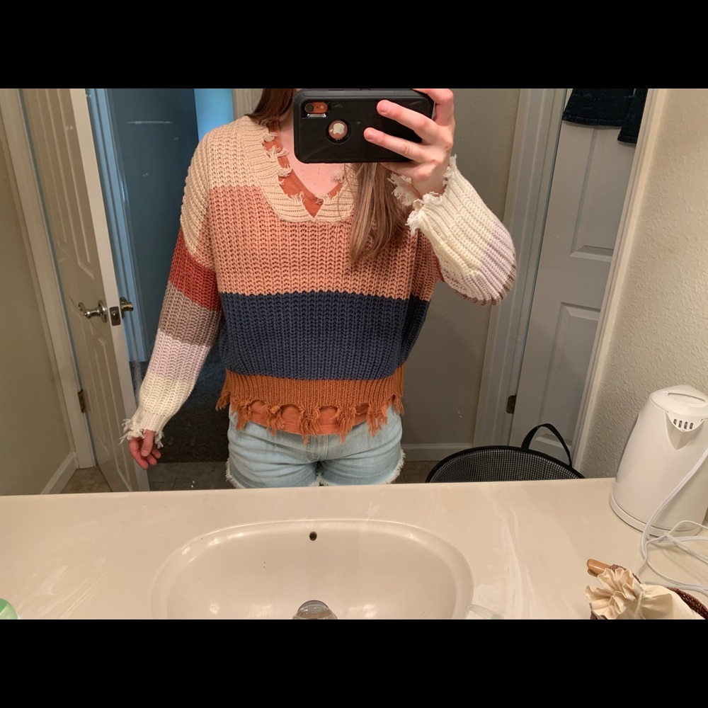 Multi colored striped fringe sweater